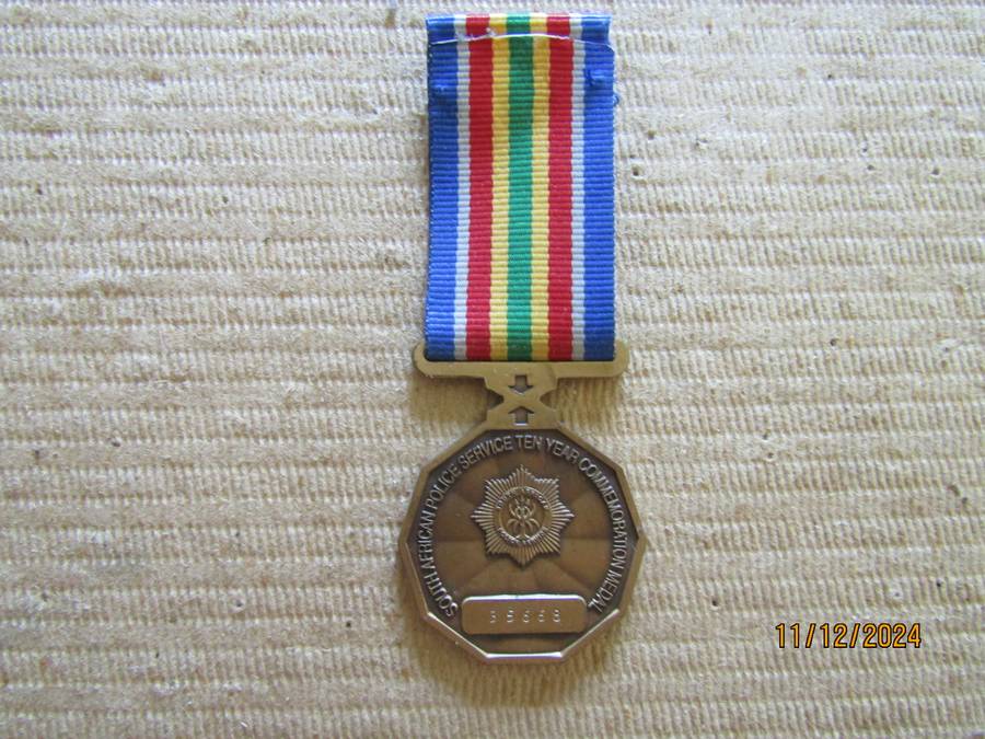 Full size Police 10 Years Commemoration  Service Medals.