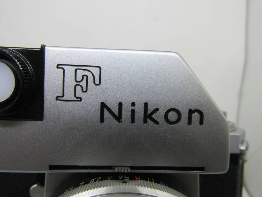 Chrome Nikon F 35mm film slr camera photomic meter nikkor-h 1:2 f50mm kogaku lens. Immaculate. Work