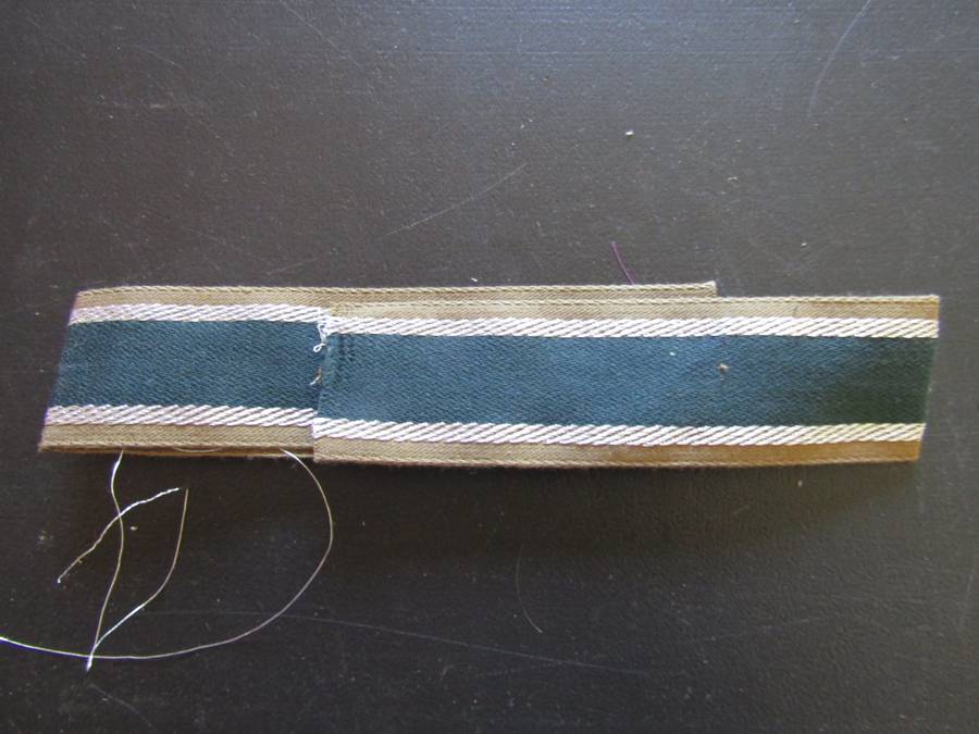 Germany, Third Reich. Unissued  Afrika Korps (GAC) Cuff Tittle Think is a reproduction. Not Sure.