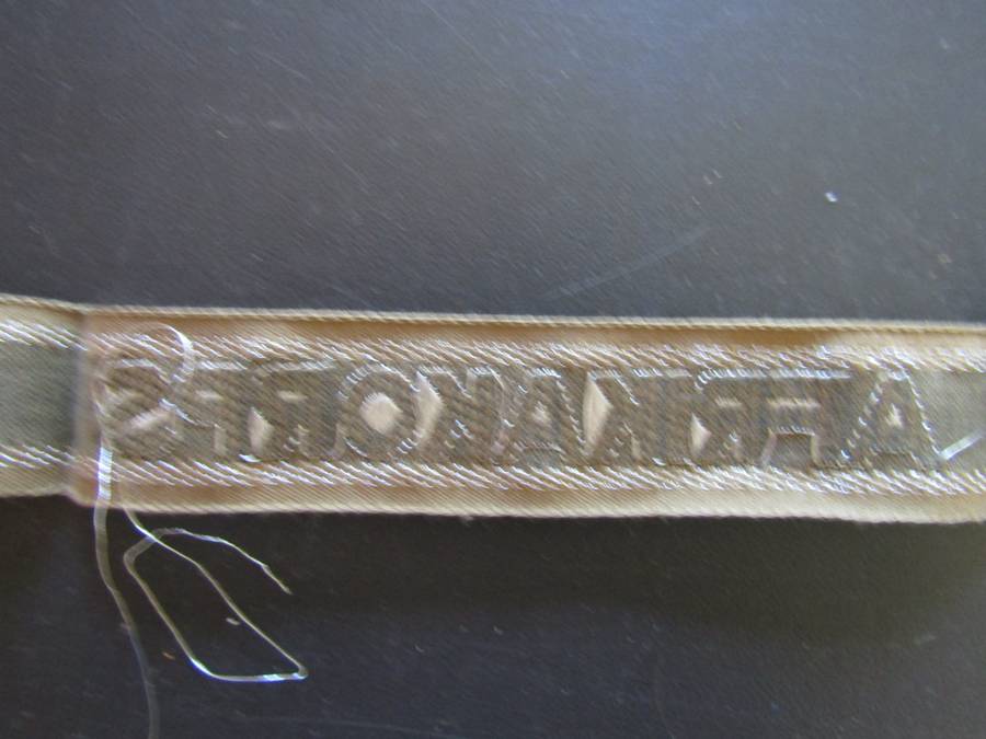 Germany, Third Reich. Unissued  Afrika Korps (GAC) Cuff Tittle Think is a reproduction. Not Sure.