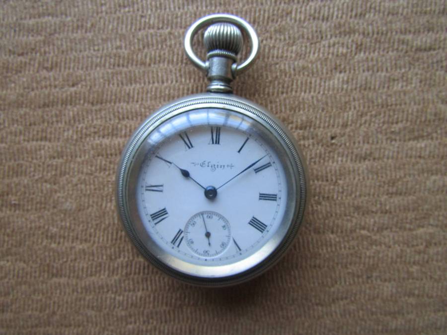 Elgin American Pocket watch. Starts ticking and stops. Need service