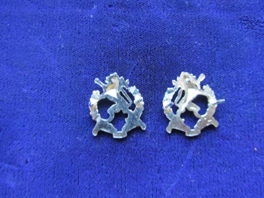 Pair of Regiment Highveld Collar Badges. Pins intact.