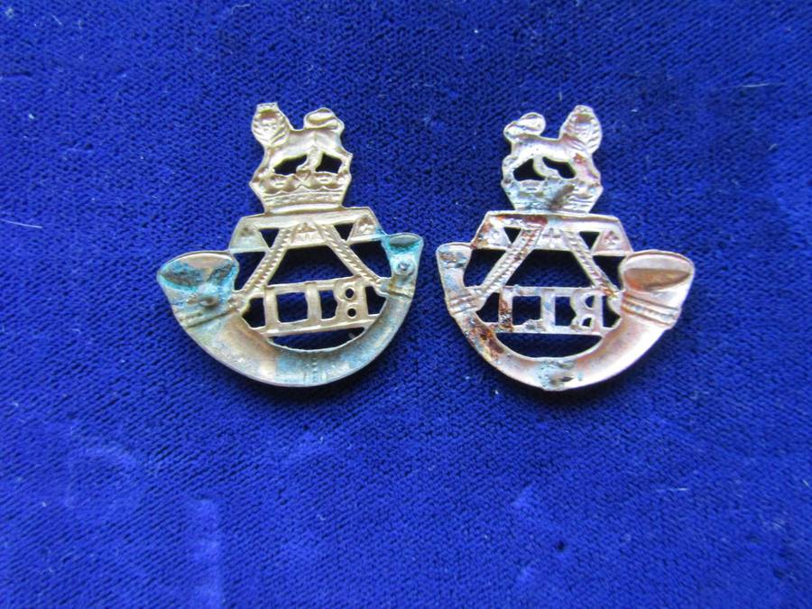 Pair of Royal Light Infantry Collar Badges. Pins intact.