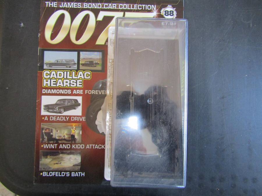 007 Cadillac Hearse  - Diamonds are Forever - scale 1/43. Sealed. with Book Nr 88