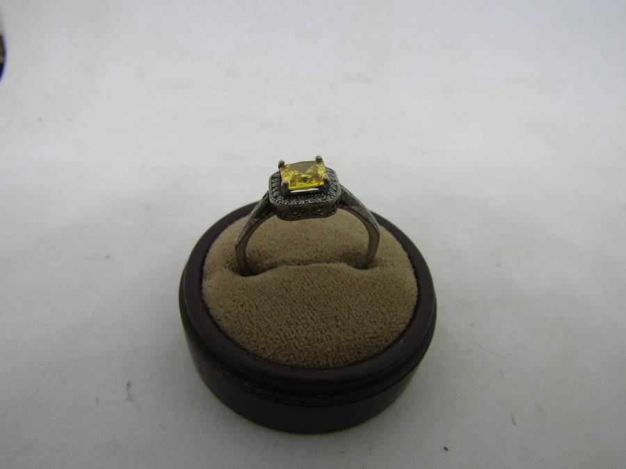 Sterling Silver women's ring with Yellow stone. size 14 box not incl