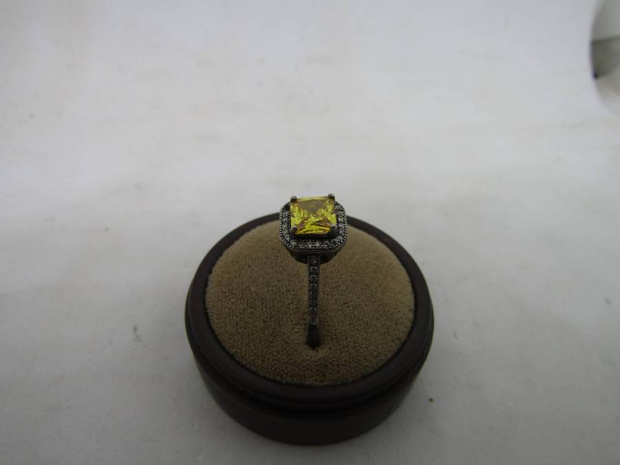 Sterling Silver women's ring with Yellow stone. size 14 box not incl