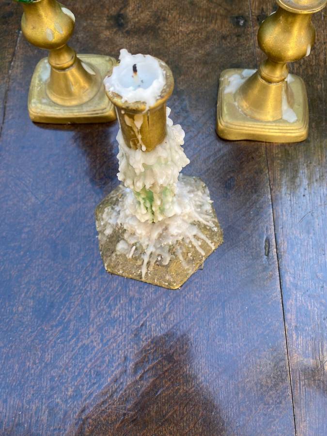 Three brass candle holders