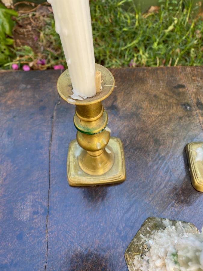 Three brass candle holders