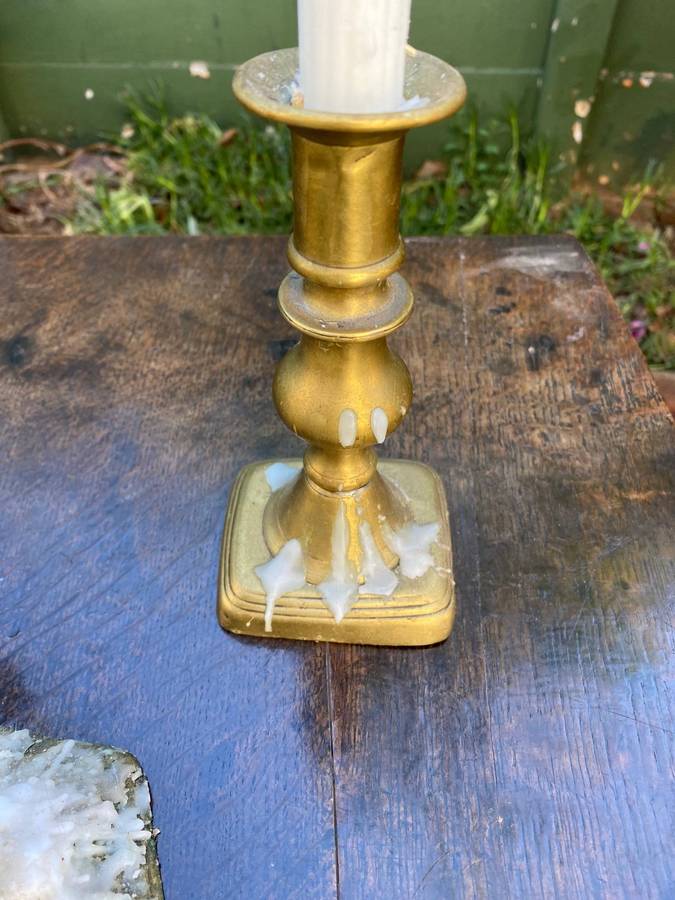 Three brass candle holders