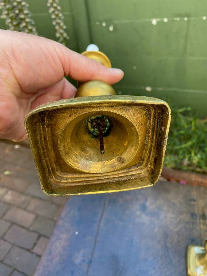 Three brass candle holders