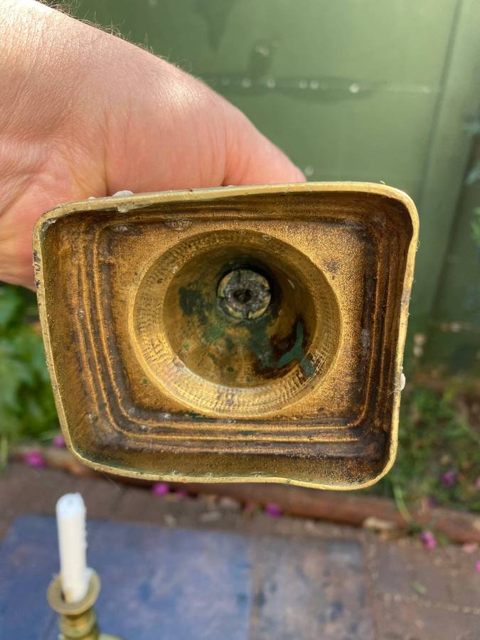 Three brass candle holders