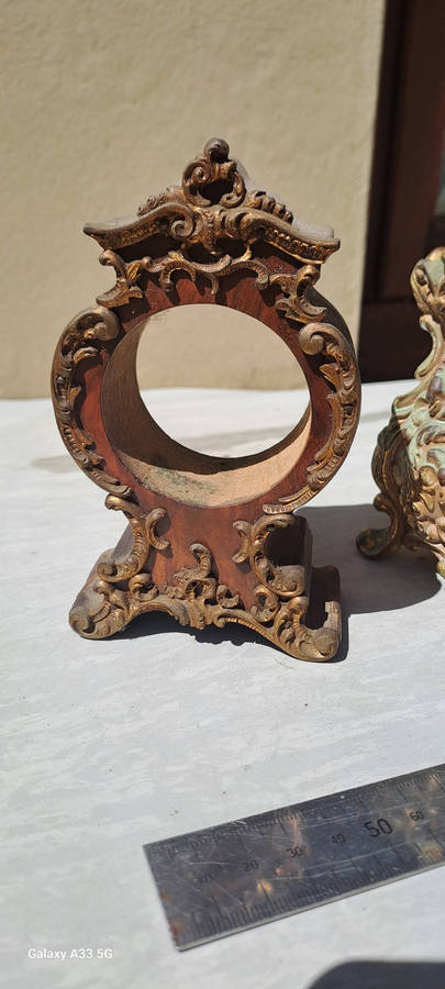 2 small clock housings 1 wood 1x brass and 1x small clock
