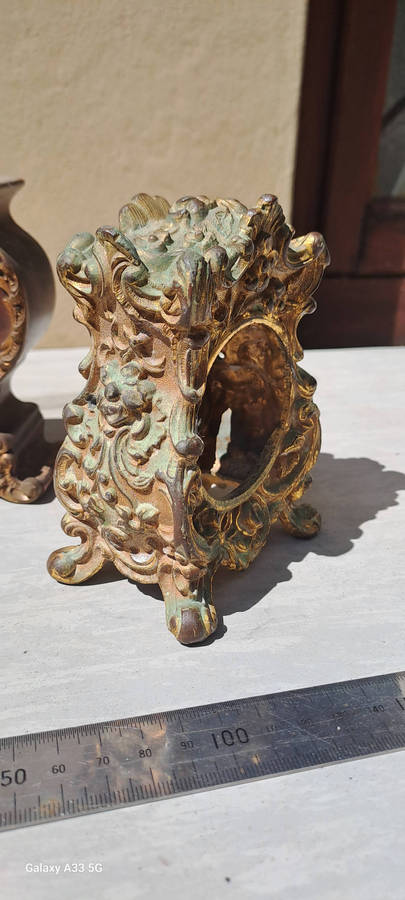 2 small clock housings 1 wood 1x brass and 1x small clock