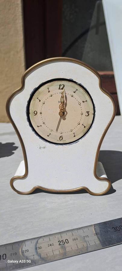 2 small clock housings 1 wood 1x brass and 1x small clock