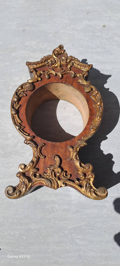 2 small clock housings 1 wood 1x brass and 1x small clock