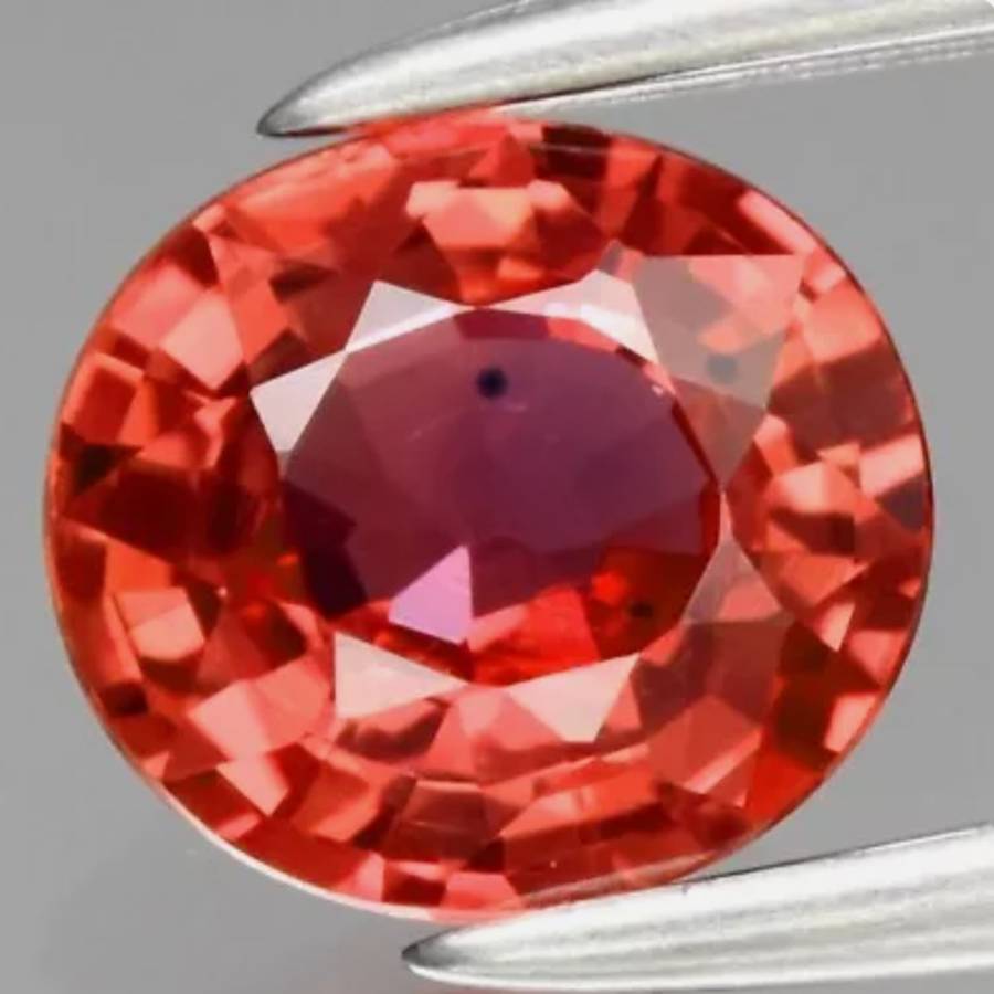 Beautiful! 5.5 x 5mm Oval Cut Natural Pinkish Orange Sapphire