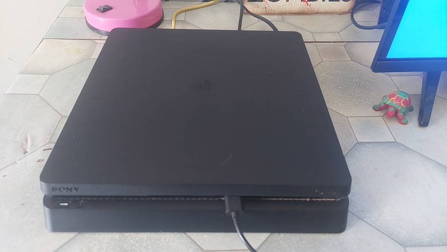 PS4 console and 2 controls