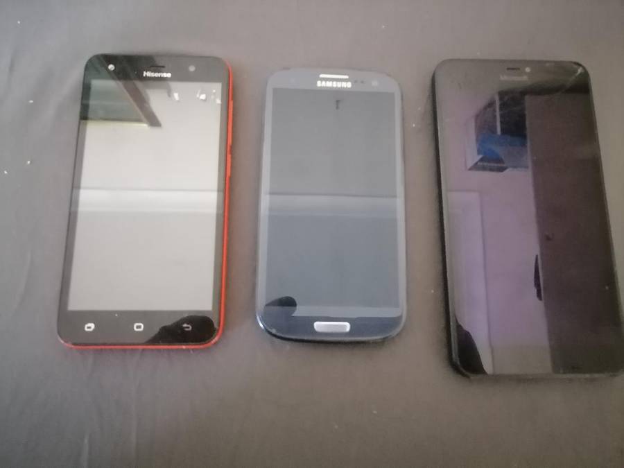 Lot of 3 x cell phones - Huawei, Samsung, Microsoft - Sold as is - One bid for the lot