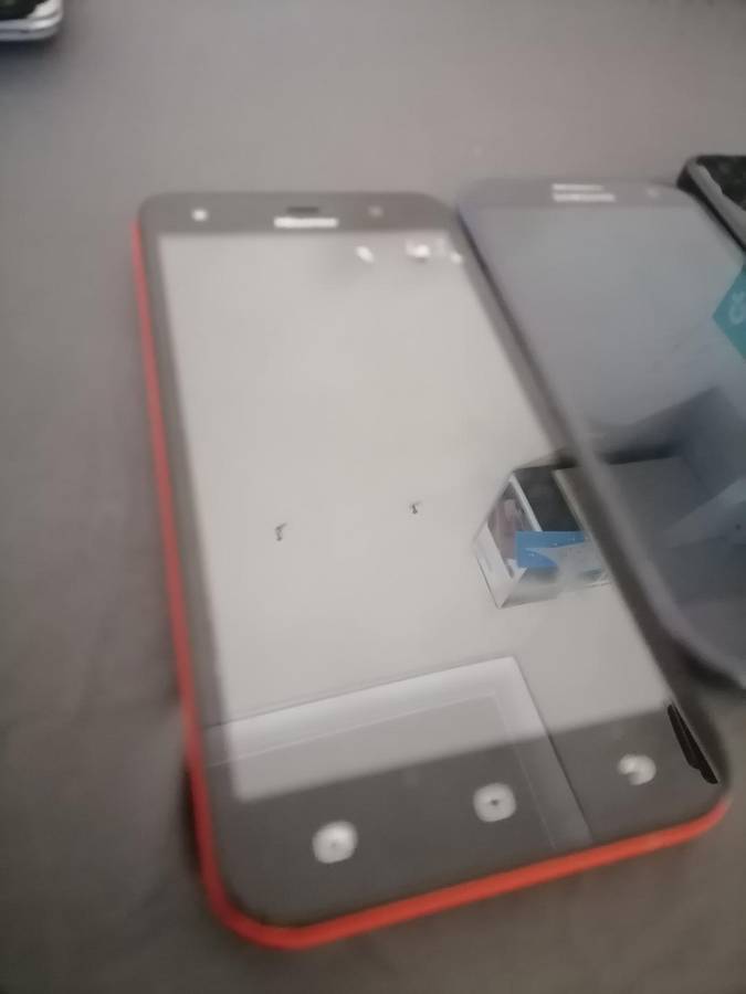 Lot of 3 x cell phones - Huawei, Samsung, Microsoft - Sold as is - One bid for the lot