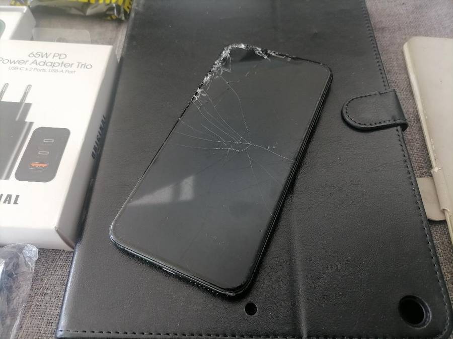 LOT OF APPLE PHONE, TABLET,NEW PHONE COVERS , ETC, ONE BID FOR THE LOT*