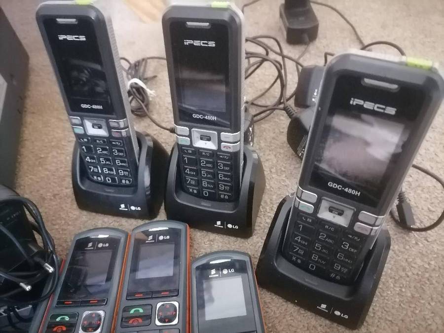 Communications system with switchboard,cordless phones,base stations etc*