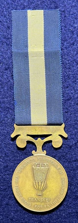 SA Military Decorations & Medals - Transkei 20 Years Service Medal - FS, No 56, Named WO Nqweniso