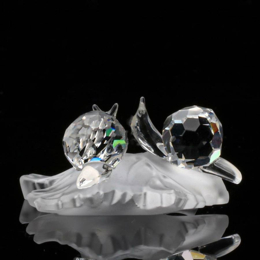 Swarovski Crystal Baby Snails on a Vine Leaf Among Flowers and Foliage