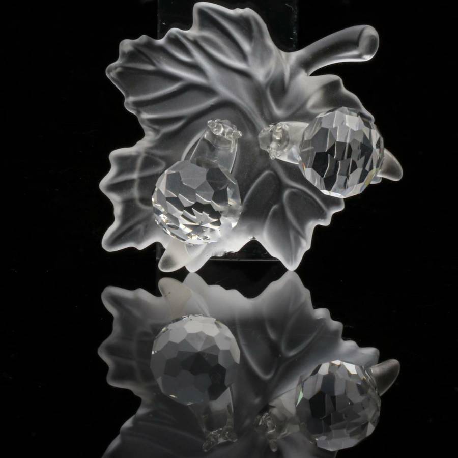 Swarovski Crystal Baby Snails on a Vine Leaf Among Flowers and Foliage