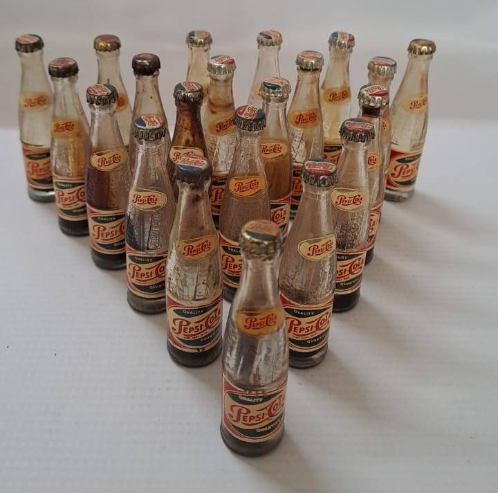 Pepsi miniature glass cold drink bottles x21 available. You bid on one only.
