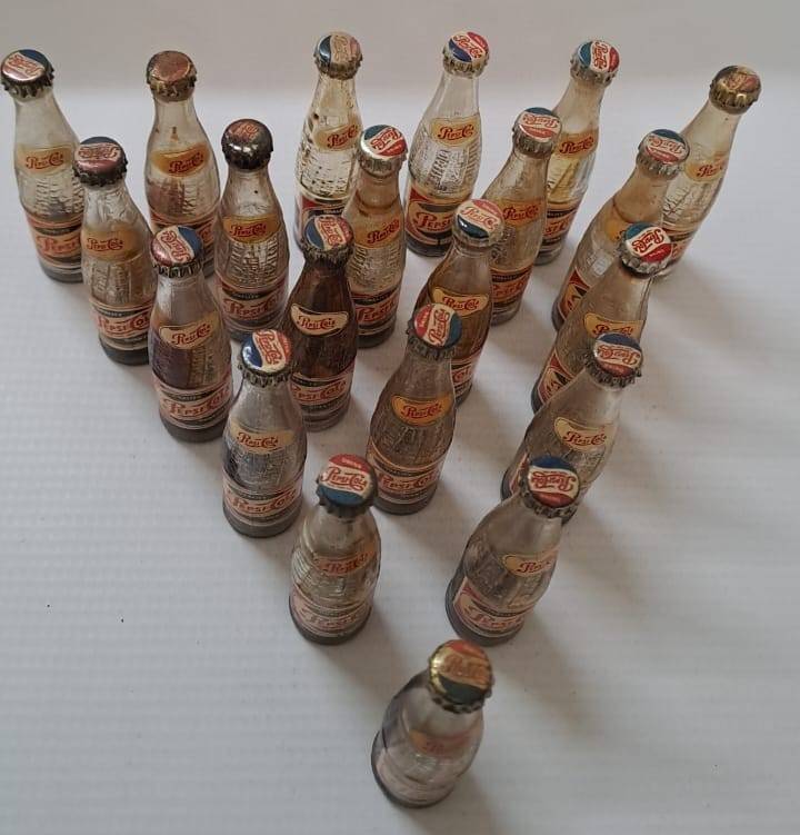 Pepsi miniature glass cold drink bottles x21 available. You bid on one only.