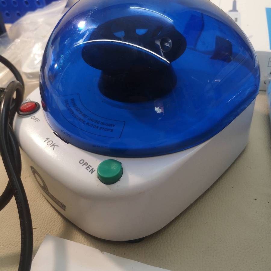 New Centrifuge Machine and Huge Bundle of Sealed Boxes of Medical Lab equipment