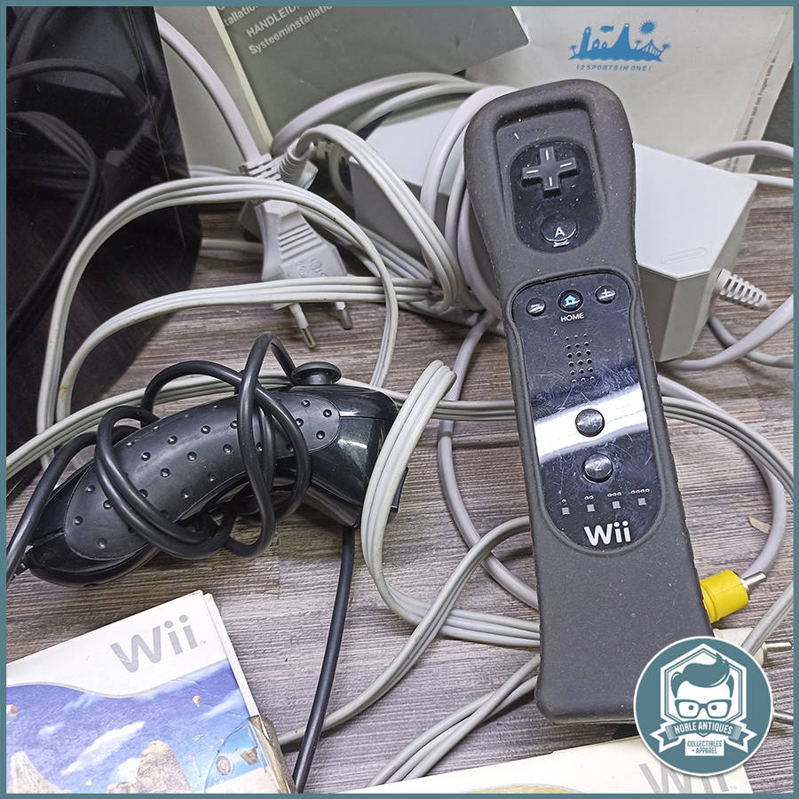 Original Black Wii Console, good condition, No Action Bar
