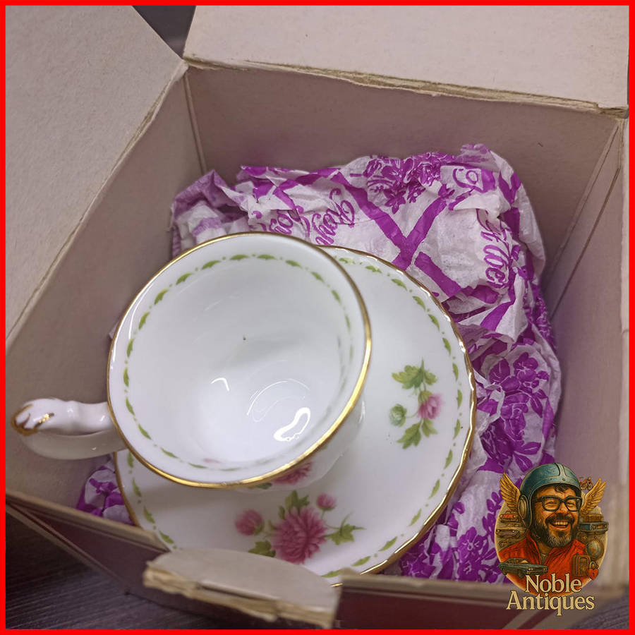 Boxed Royal Albert "Flowers of the Month" Mini teacup and saucer, November