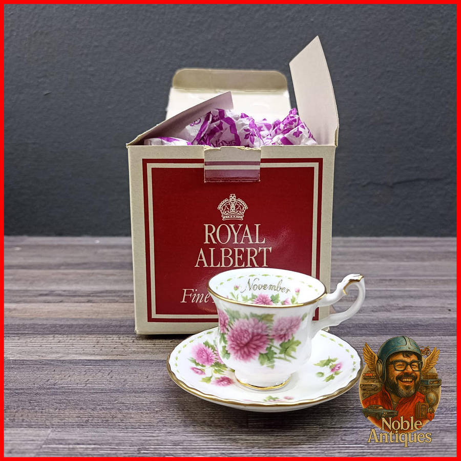 Boxed Royal Albert "Flowers of the Month" Mini teacup and saucer, November