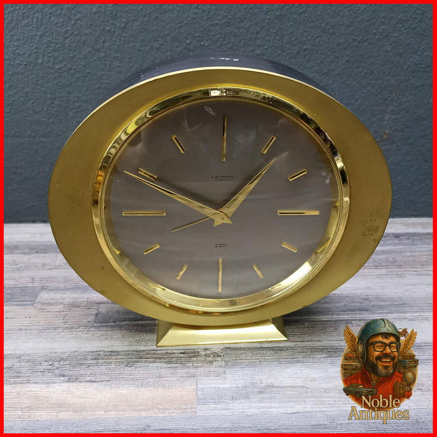 Swiss 15 Jewel Looping Clock, brass and Metal - Extremely Heavy