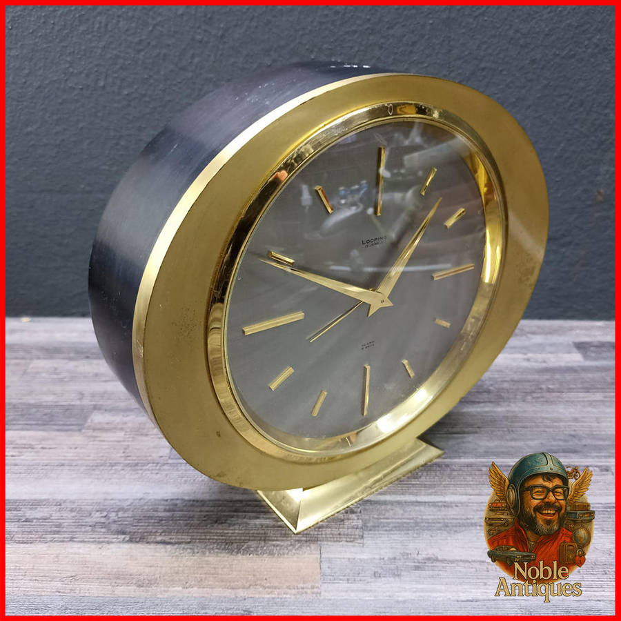 Swiss 15 Jewel Looping Clock, brass and Metal - Extremely Heavy