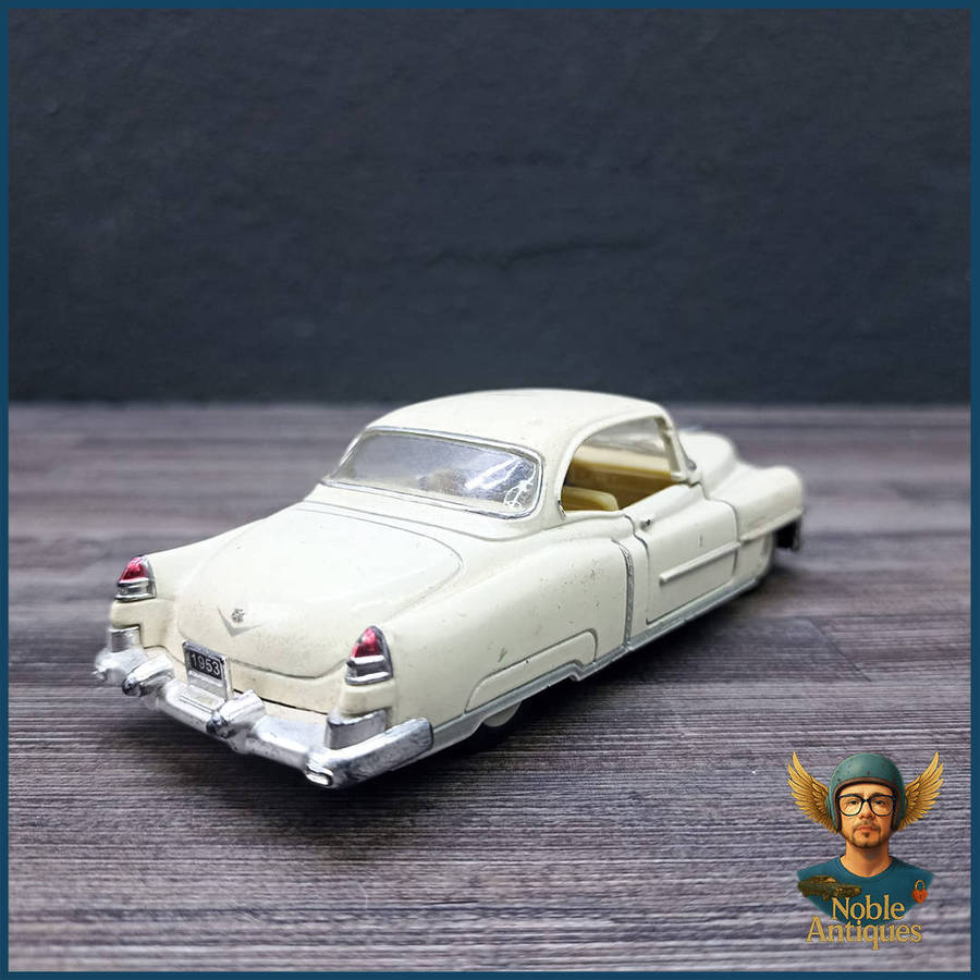 Kinsmart 1:43 scale die-cast model of a 1953 Cadillac Series 62 Coupe