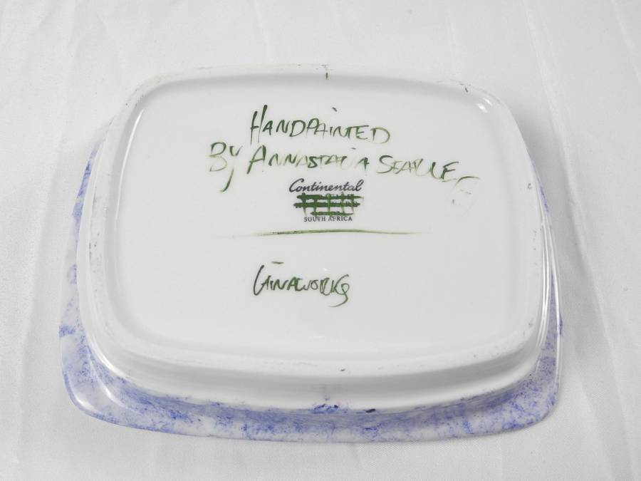 Hand painted ceramic dishes featuring the Agapanthus