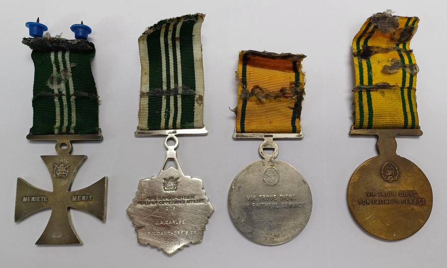 South African Prison Service Medal Group of 4, which includes Cross and Medal for Merit