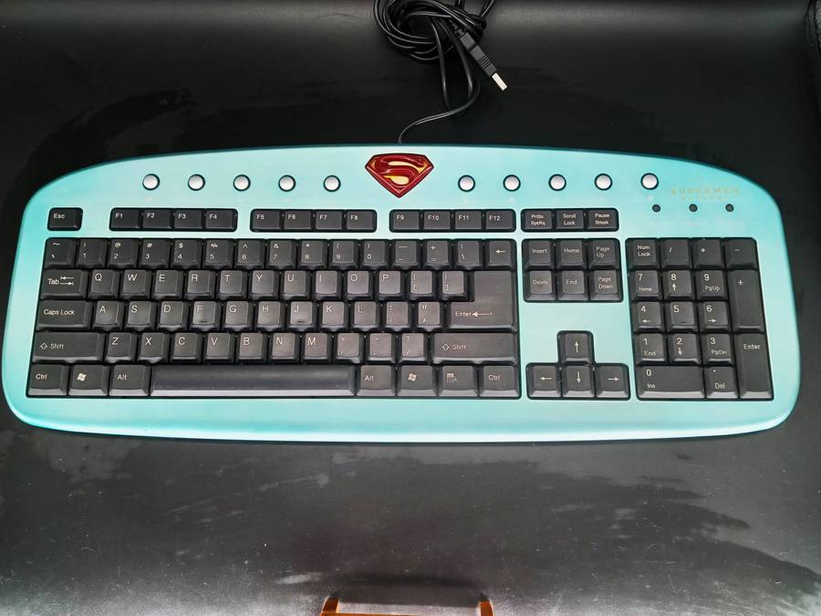 SUPERMAN RETURNS!!!! Spectacularly styledSP-6000 Super Slim keyboard in soft metallic aqua.