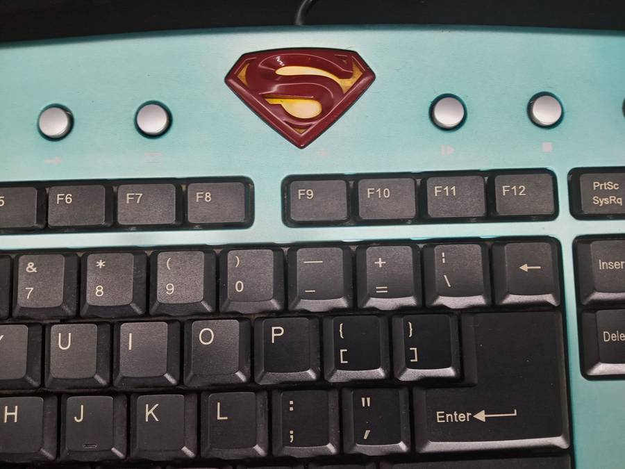 SUPERMAN RETURNS!!!! Spectacularly styledSP-6000 Super Slim keyboard in soft metallic aqua.