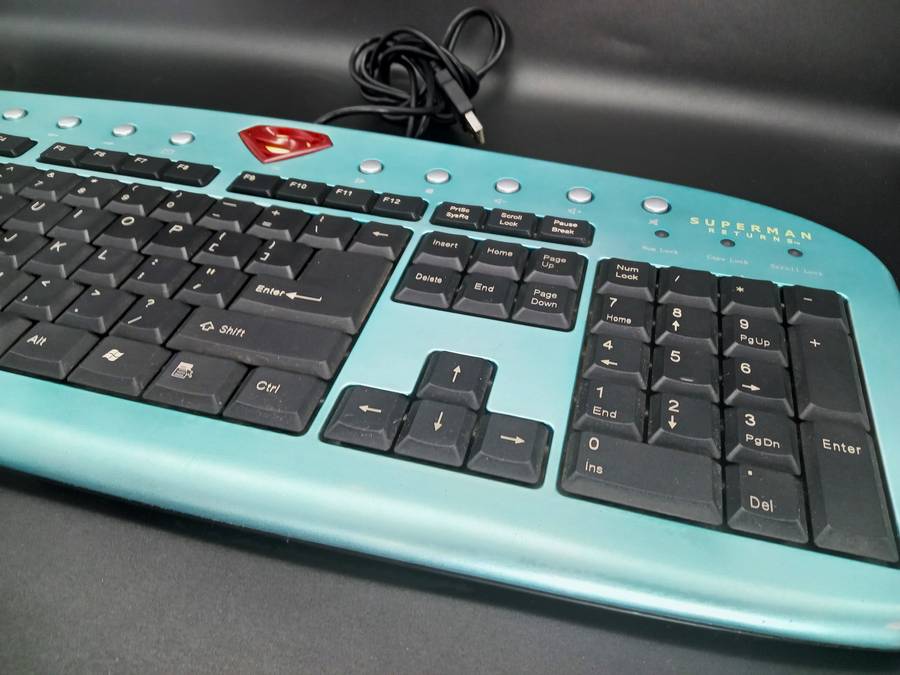 SUPERMAN RETURNS!!!! Spectacularly styledSP-6000 Super Slim keyboard in soft metallic aqua.