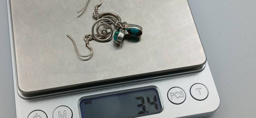 Pair of Sterling Silver Spiral Earrings with Turquoise Teardrop