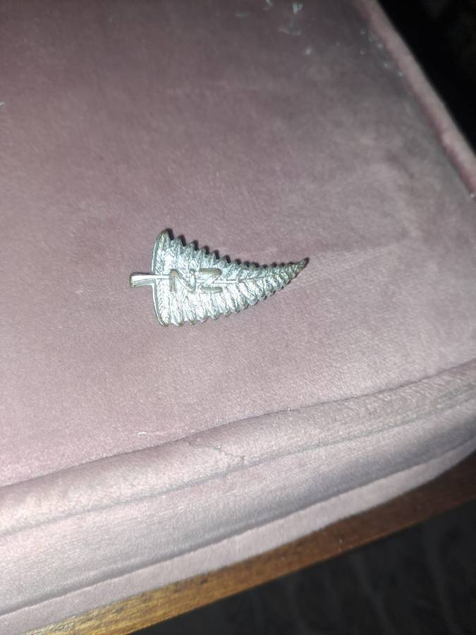 4 x All Blacks rugby books, 730 pages plus All Black pin badge