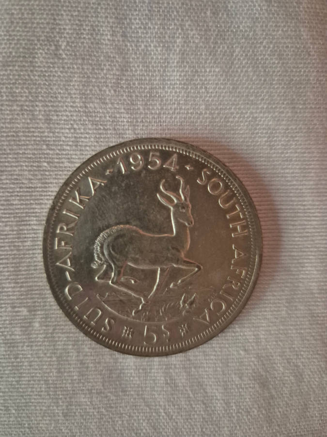 12× 5 shillings coins ..1 bid for lot see photos