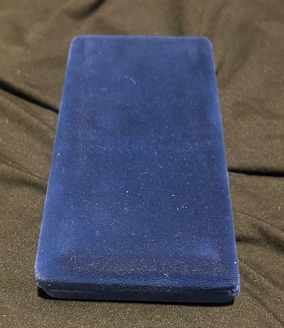 Paul Harris Fellow award, which includes the medallion