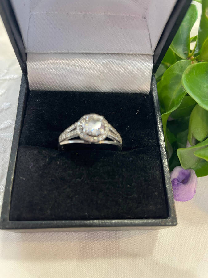 Bright Sterling Silver 925 stamped Engagement, promise ring with CZ surrounded by smaller CZ!