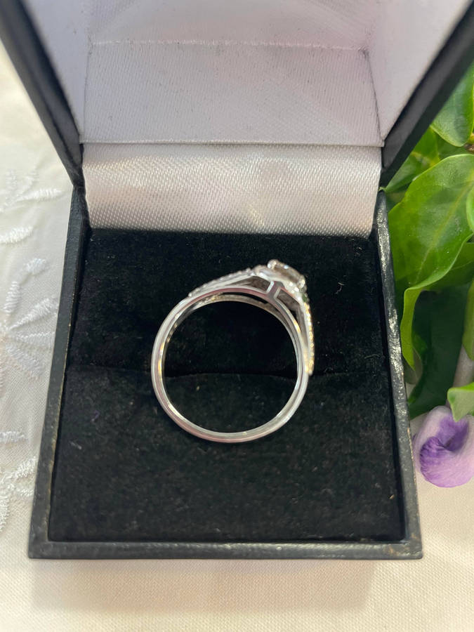 Bright Sterling Silver 925 stamped Engagement, promise ring with CZ surrounded by smaller CZ!