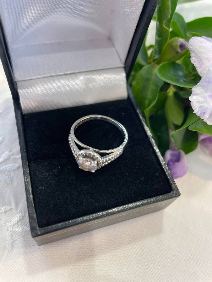 Bright Sterling Silver 925 stamped Engagement, promise ring with CZ surrounded by smaller CZ!