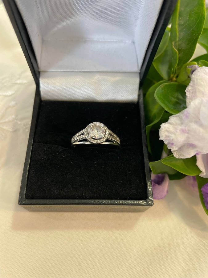 Bright Sterling Silver 925 stamped Engagement, promise ring with CZ surrounded by smaller CZ!